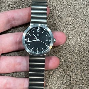 Calvin Klein Unisex Watch. Silver band and gray face